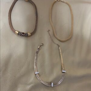 Ladies 3 gold tone necklaces, 1 gold mesh w/amber stone, gold mesh,